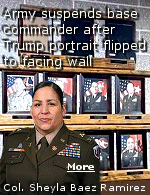 The Army has suspended a Wisconsin training base's first female commander after discovering portraits of President Donald Trump and Defense Secretary Pete Hegseth had been flipped around to face a wall. The Army has posted an undated statement on Fort McCoy's website saying Col. Sheyla Baez Ramirez has been suspended as the base's garrison commander. 